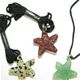 10 pc bag of assorted 25mm gemstone starfish
 on cord.